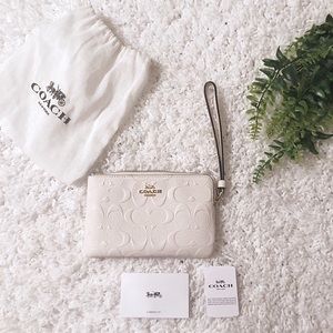 **NEW** White Embossed Coach Wristlet